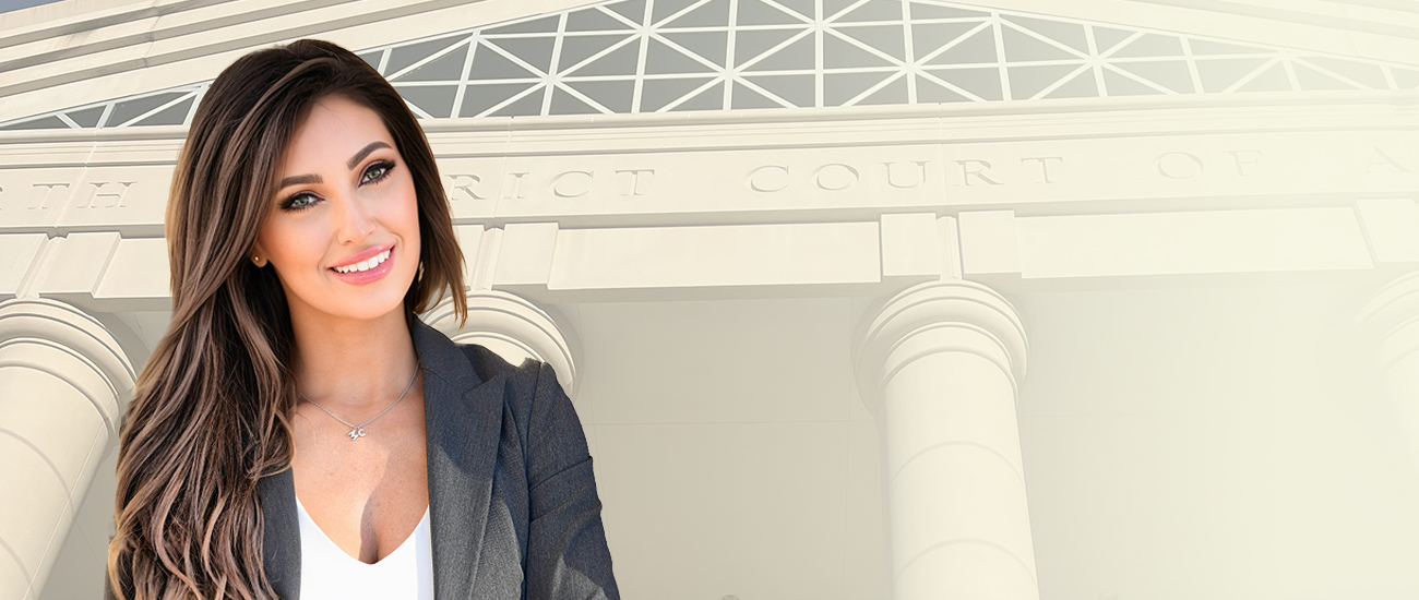 Heather S. Karmeris with a district court in the background.